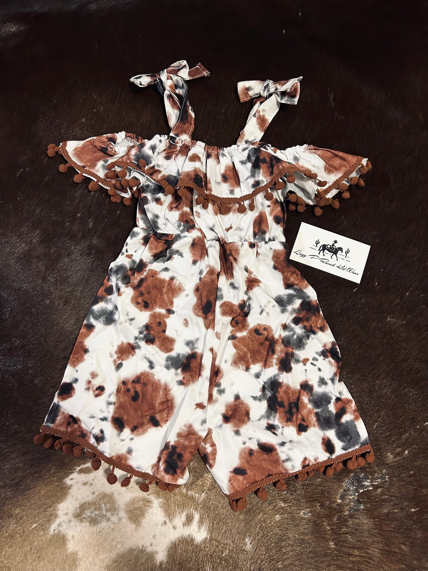 Cowhide Pom Pom Romper