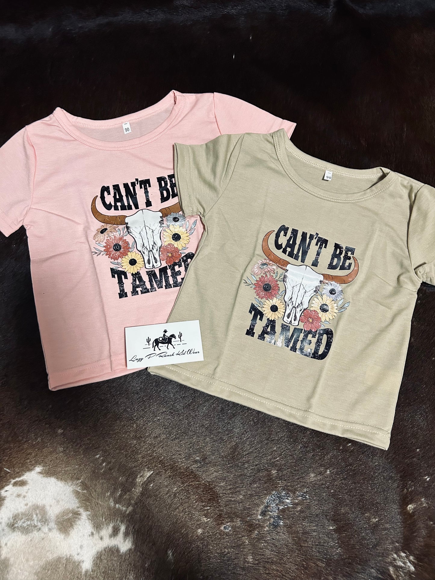 Can’t Be Tamed Tee